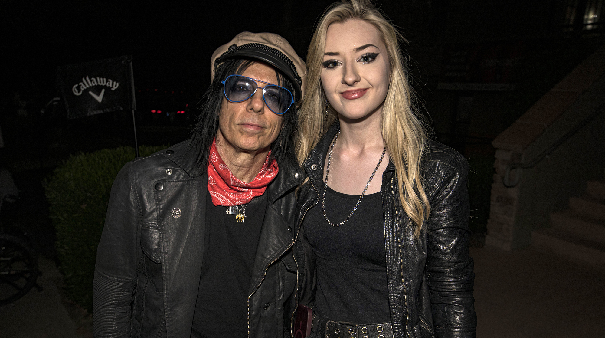 Tommy Henriksen (L) and Anna Cara pose during Alice Cooper's CoopStock 2026 at Las Sendas Golf Club on April 11, 2026 in Mesa, Arizona.
