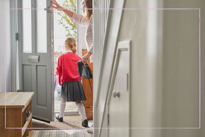 Mum taking her daughter to school