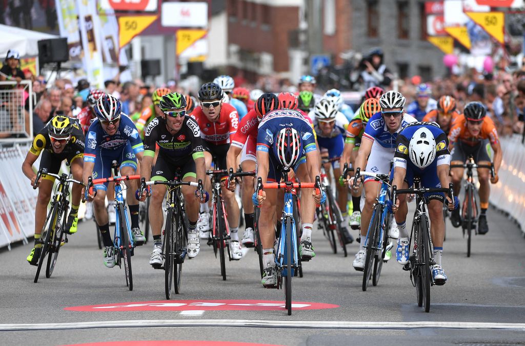 Dimitri Claeys (Wanty-Groupe Gobert) and Gianni Meersman (Etixx-QuickStep) throw their bikes for the line