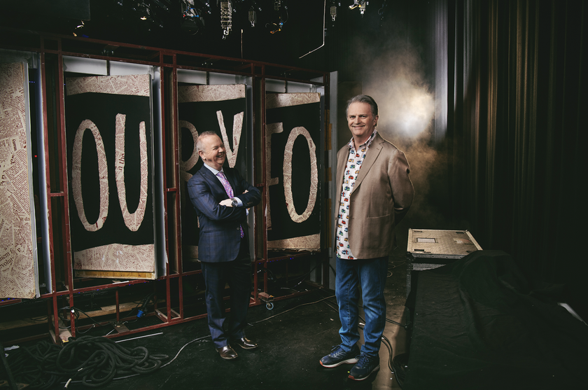 An image of Ian Hislop and Paul Merton smiling jovially behind-the-scenes on the set of Have I Got News for You.