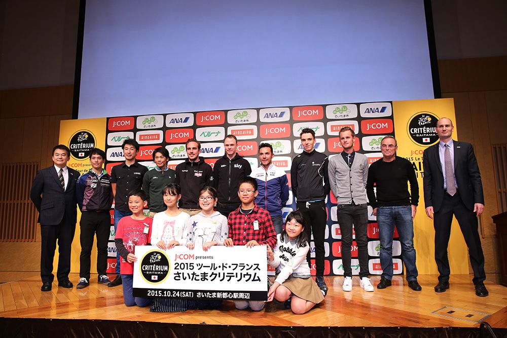 Riders on stage at the race presentation
