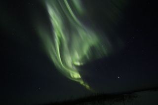 Alaska aurora from atop mountain
