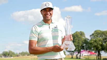 Tony Finau with the trophy after his win in the 2022 3M Open