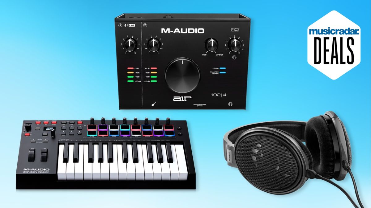 An M-Audio audio interface and MIDI keyboard with a pair of Sennheiser studio headphones on a blue background