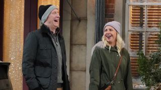 Becky and Professor Davis laughing on The Conners