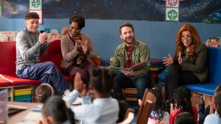 From left to right: Jacob and Barbara clapping, Charlie smiling and reading a book and Melissa clapping.