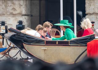 Kate Middleton fixing son Prince Louis' tie in the carriage at Trooping the Colour