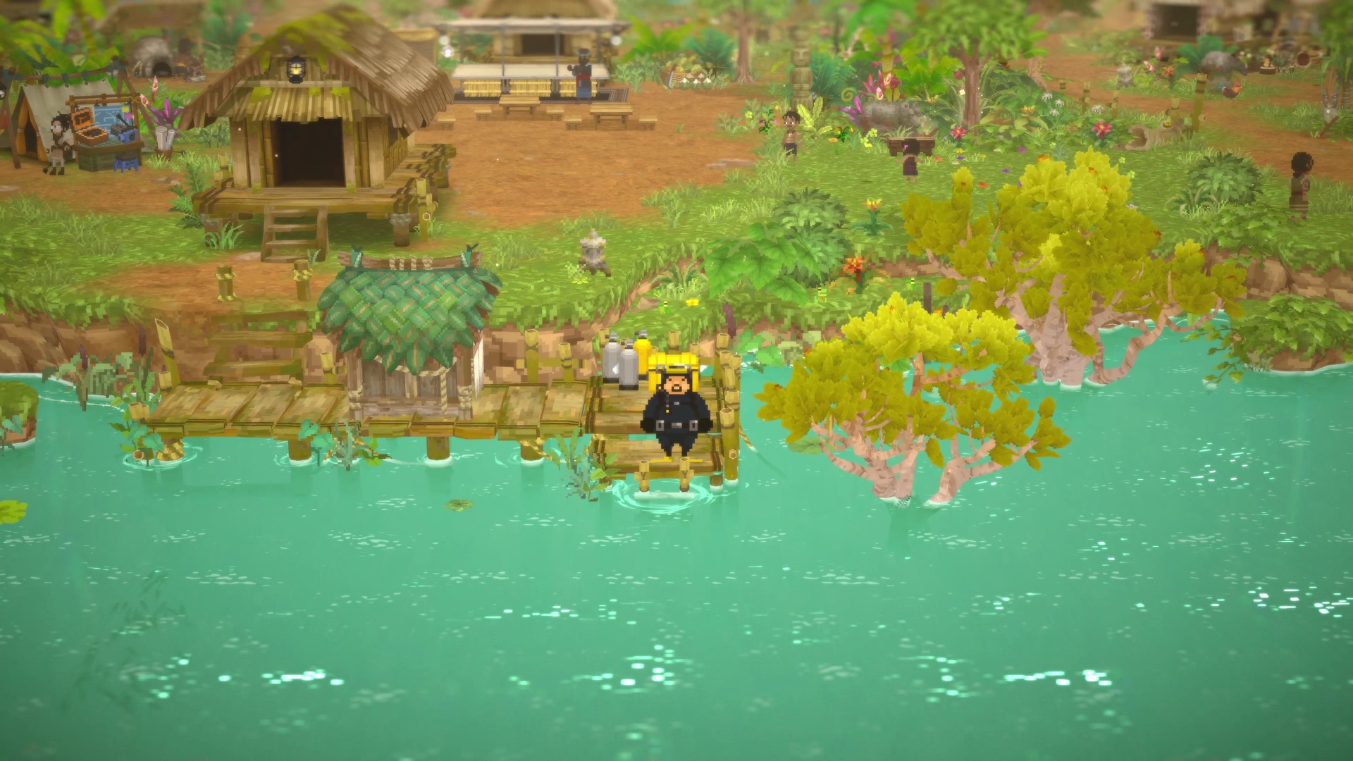 Dave sat on a pier preparing to dive into a jungle lake