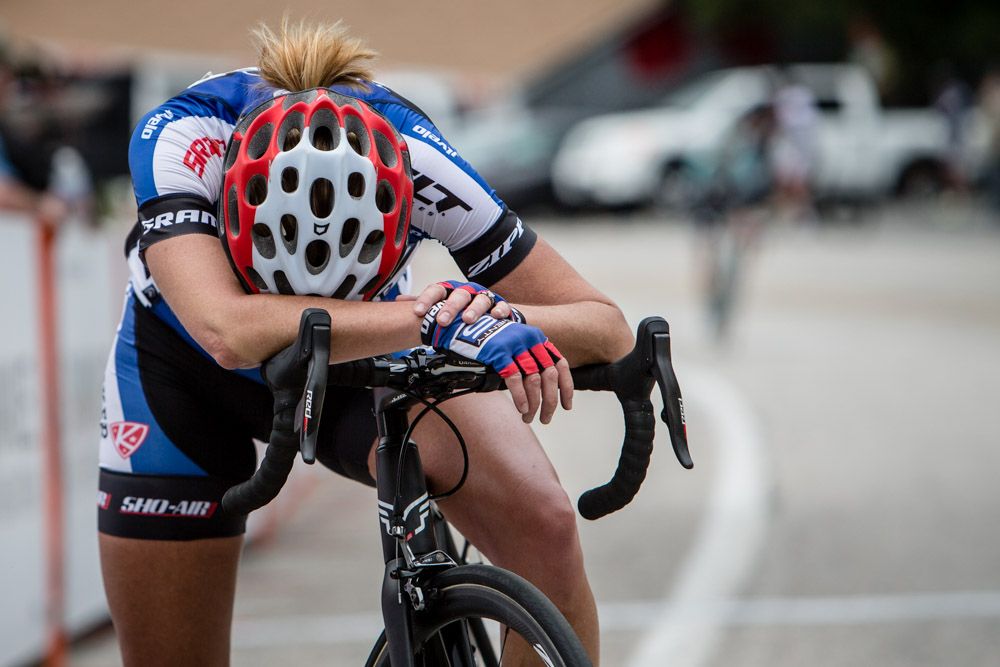 Kristin Armstrong (Twenty 16) stops to recover after crossing the line in second place