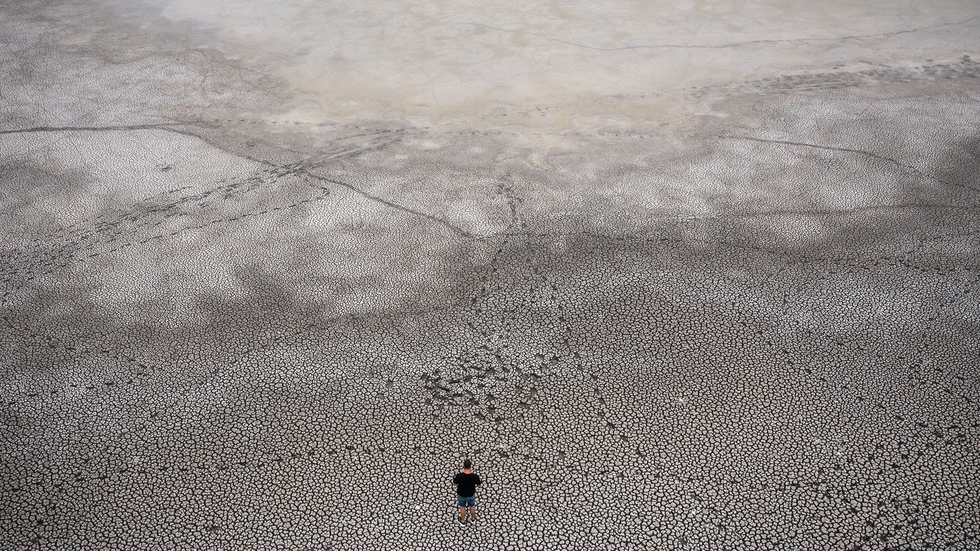 The dry lakebed of Lake Velence is visible after water level drops to lowest on record following weeks of scorching temperatures Pakozd, Hungary