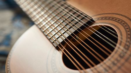 Close-up of a soundhole on a 12-string acoustic guitar