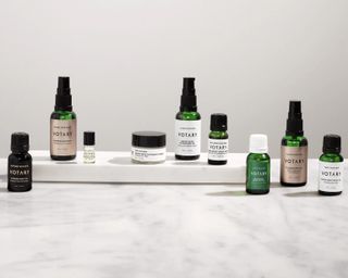 Green and black bottles of skincare