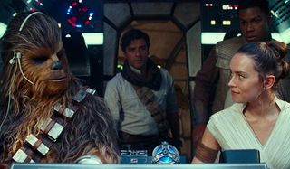 Star Wars: The Rise of Skywalker Chewie, Poe, Finn, and Rey in the cockpit of the Millennium Falcon