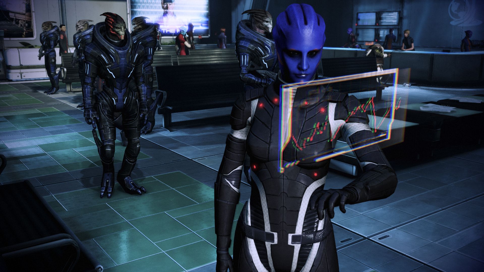 An asari stares at a wrist-mounted computer