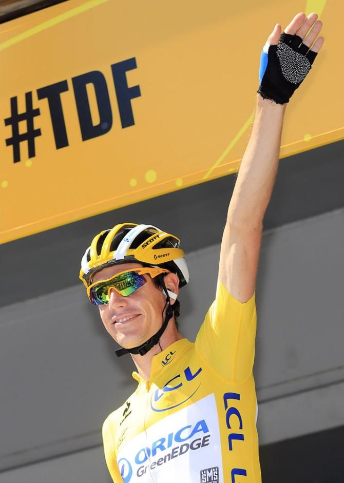Tour de France leader Daryl Impey (Orica GreenEdge) is all smiles as he signs on for the start of stage 7