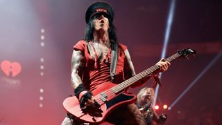 Musician Nikki Sixx of Motley Crue performs onstage during the 2014 iHeartRadio Music Festival at the MGM Grand Garden Arena on September 19, 2014 in Las Vegas, Nevada. 