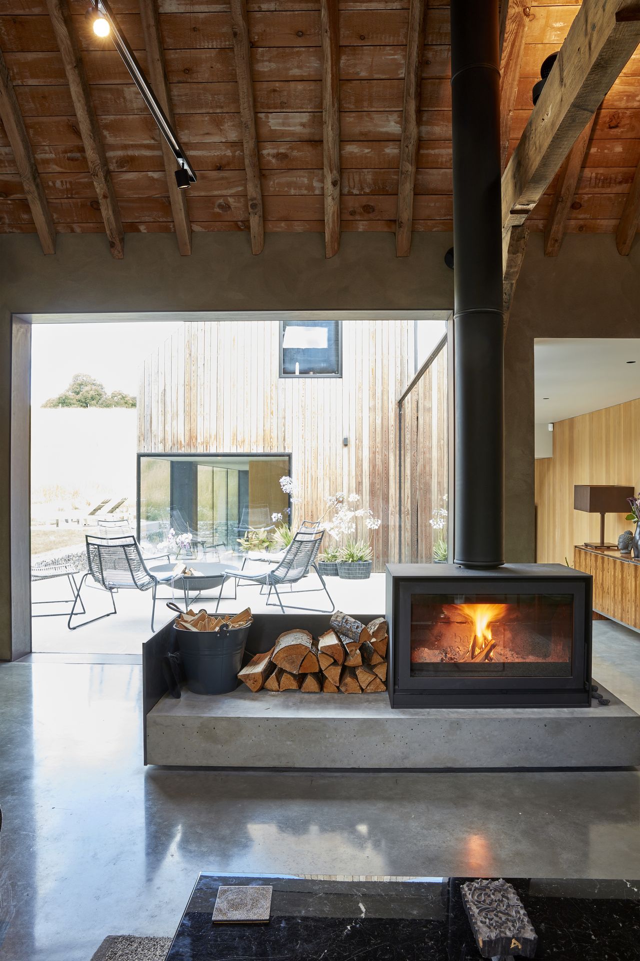modern woodburning stove with view to outside