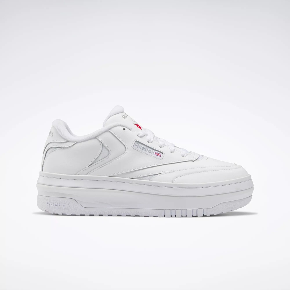 white platform sneakers by Reebok