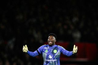 Manchester United goalkeeper #24 Andre Onana celebrates his team second goal during the English Premier League football match between Manchester United and Nottingham Forest at Old Trafford in Manchester, north west England, on December 7, 2024.