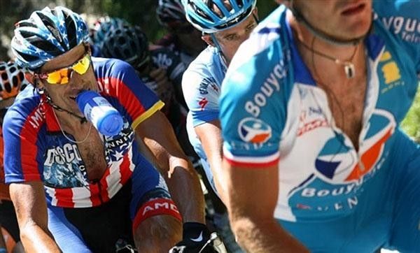George Hincapie carries bottle in the best way possible up the hill.