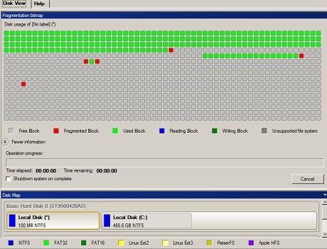 A screenshot image of Total Defrag 2010 shows a graphical disk map with fragmented blocks in red.