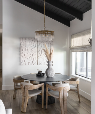 Modern dining room space accented chairs made from weathered wood