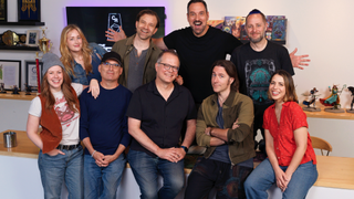 An image of the Critical Role crew posing with senior designers Jeremy Crawford and Chris Perkins, former employees of Wizards of the Coast.