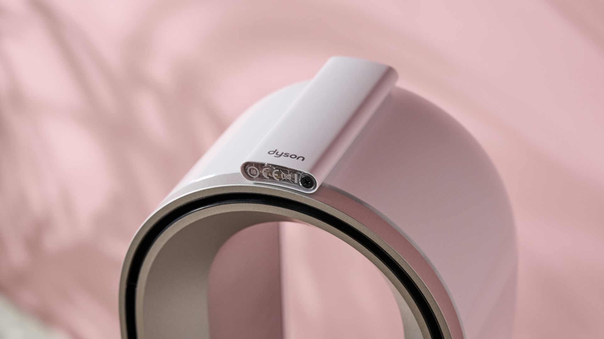 The remote control is placed on top of the Dyson Hot and Cool HF1.