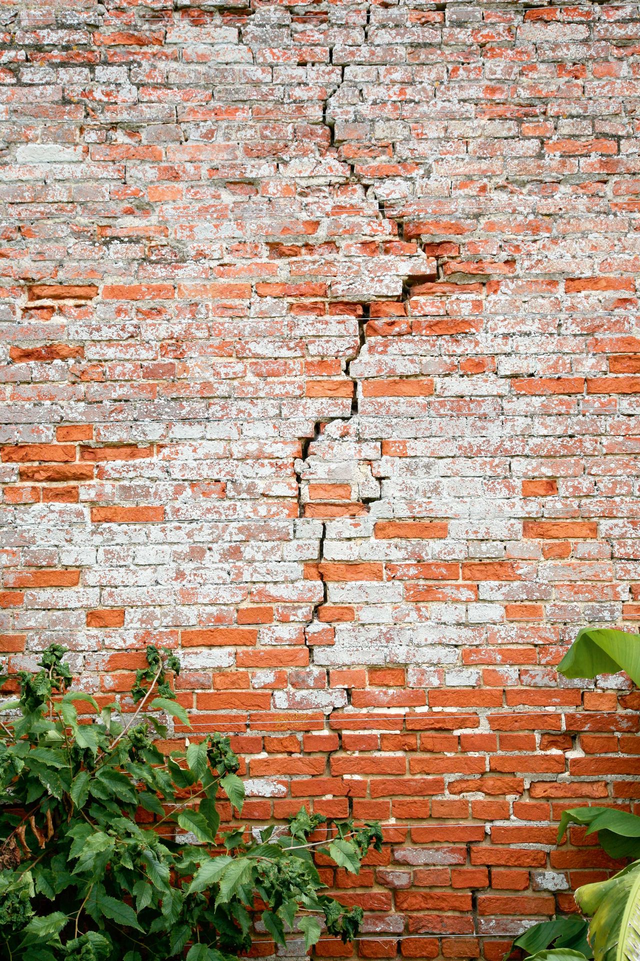 Cracked exterior brick wall