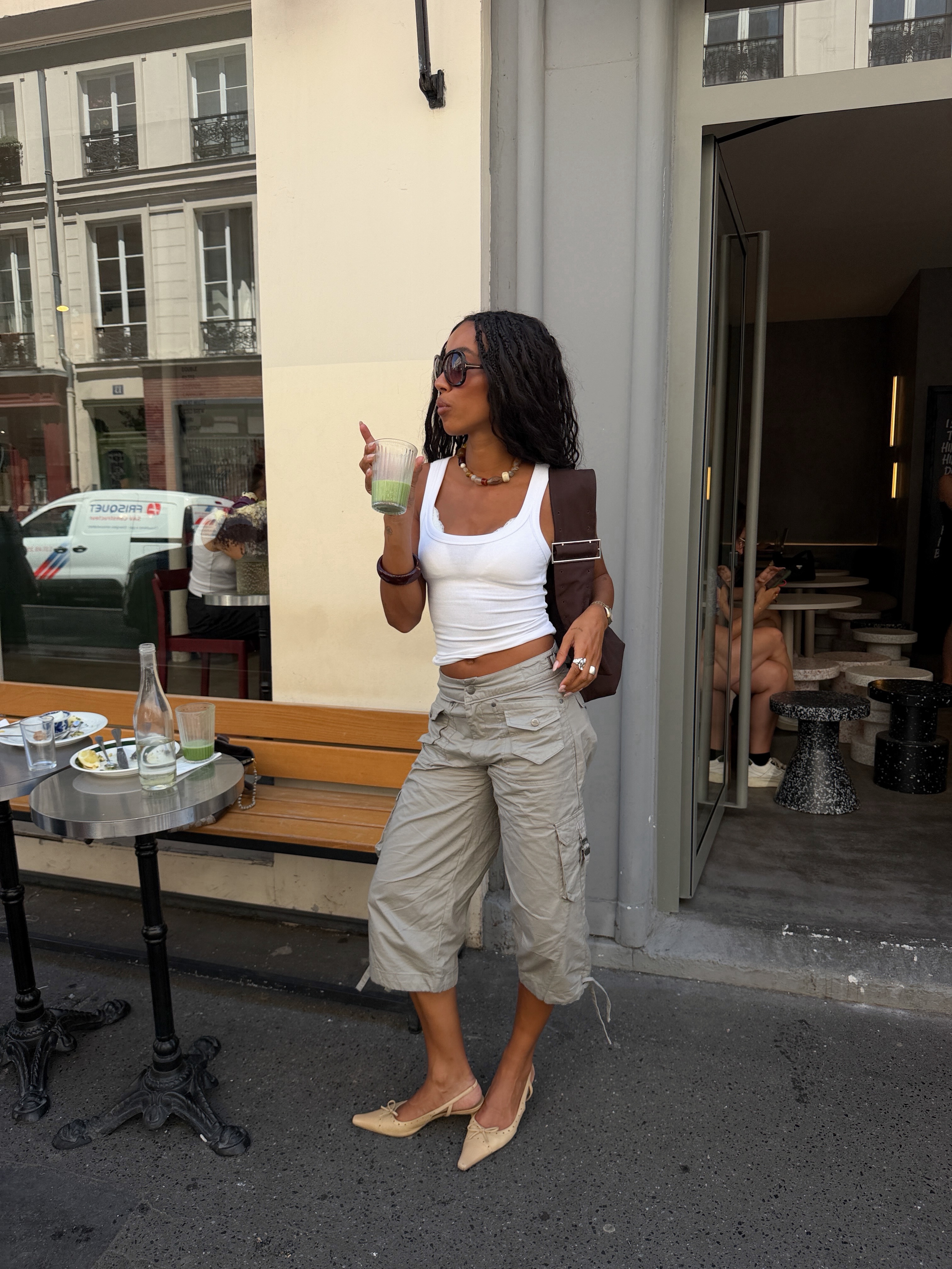 A woman wearing light-latte shoes in summer 2026.