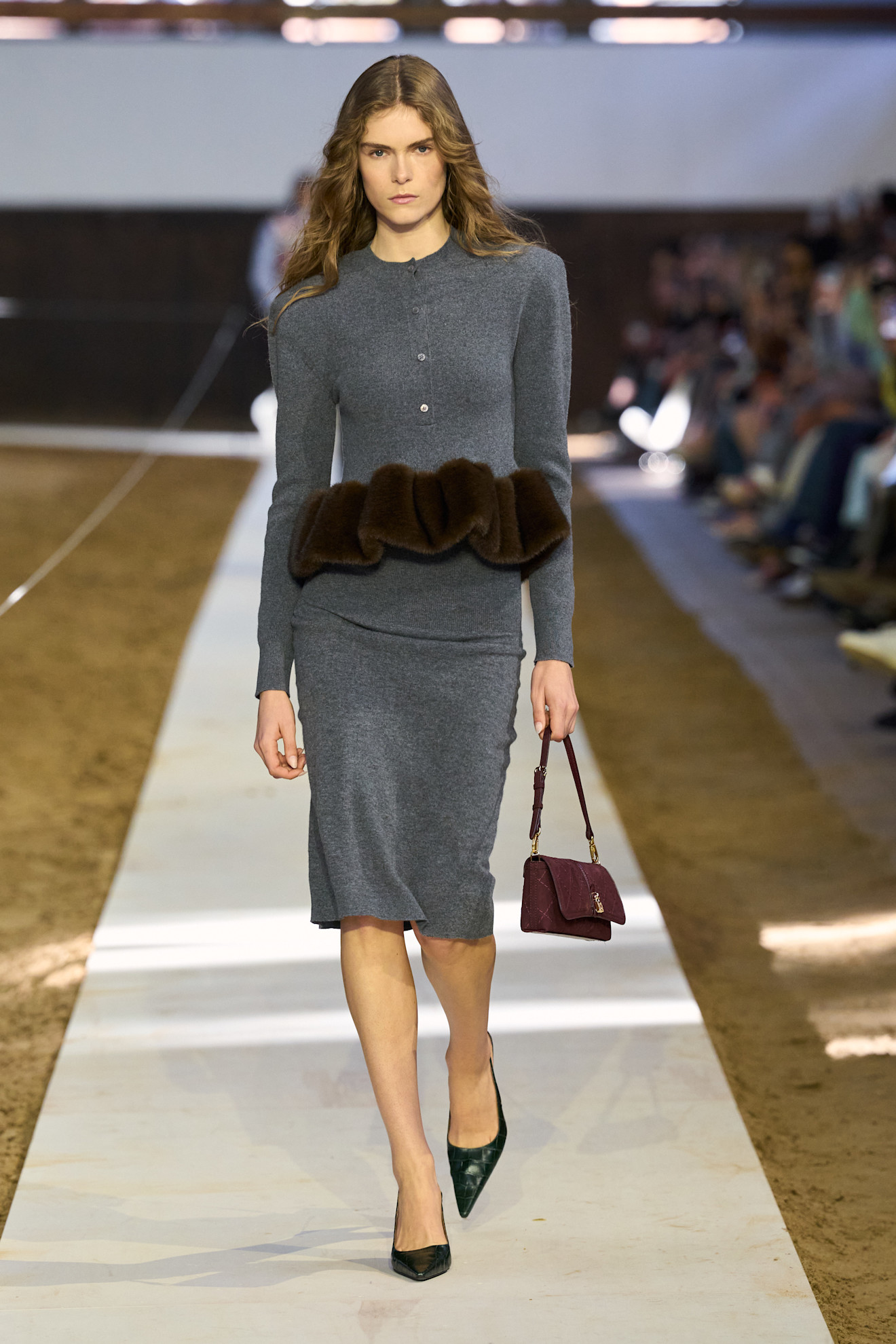 A model wears Anne Hathaway's gray pencil skirt on the Stella McCartney Fall 2026 runway