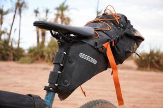 Image shows Ortlieb's Seat-Pack mounted on a gravel bike that was used on a bikepacking loop across the Atlas mountains in Morocco