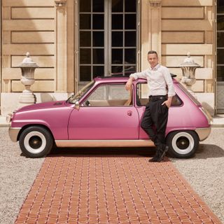 Pierre Gonalons beside pink car