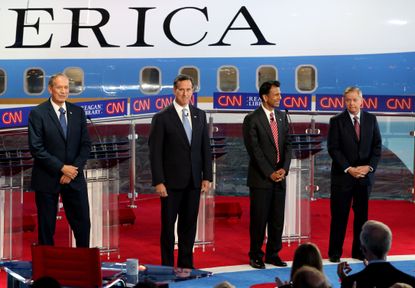 The four Republican presidential candidates on stage at the first CNN Republican Debate.