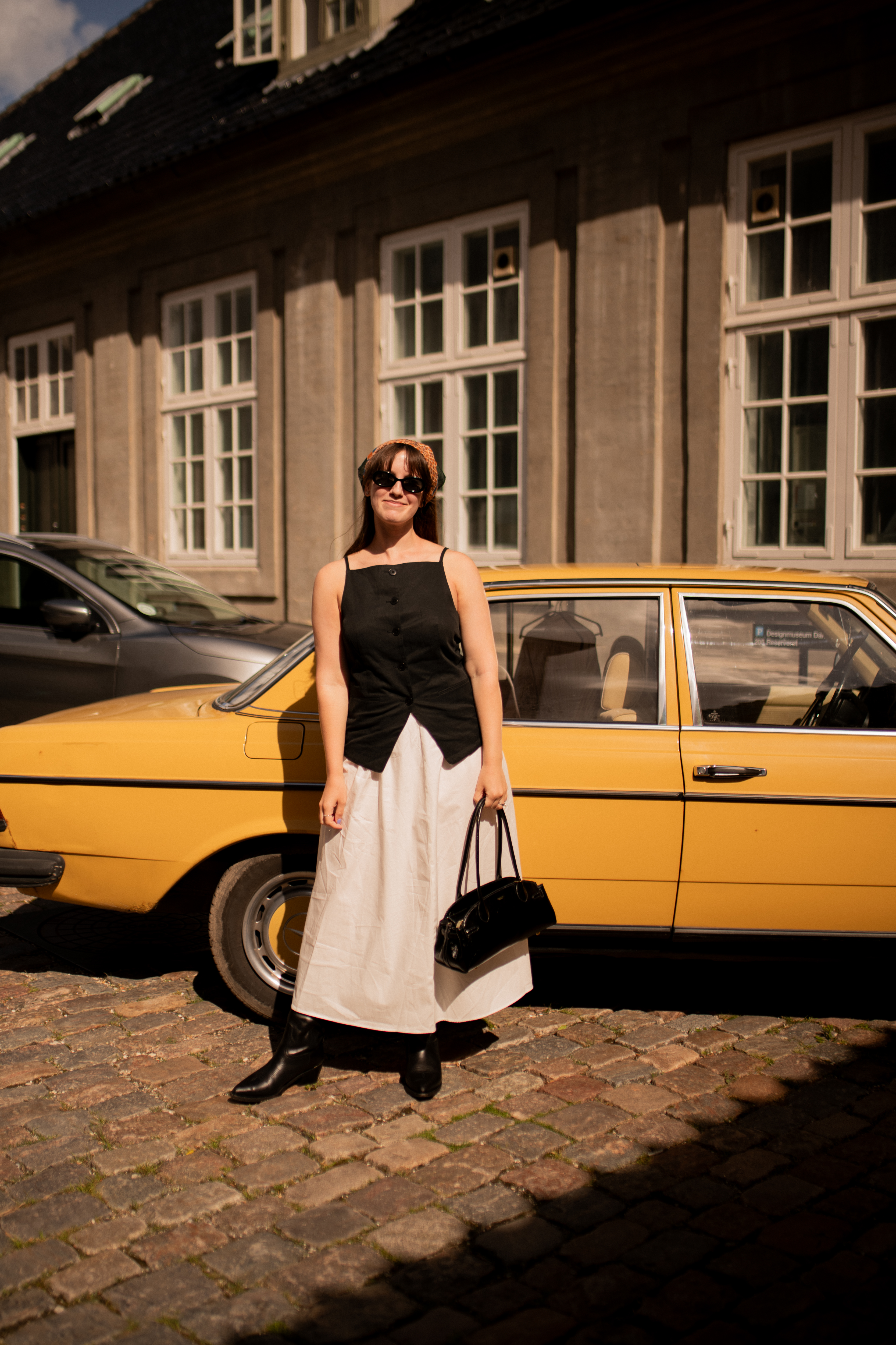 Halie LeSavage wears a madewell and sezane outfit at Copenhagen Fashion Week