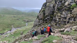 A group hiking down after a climbing session