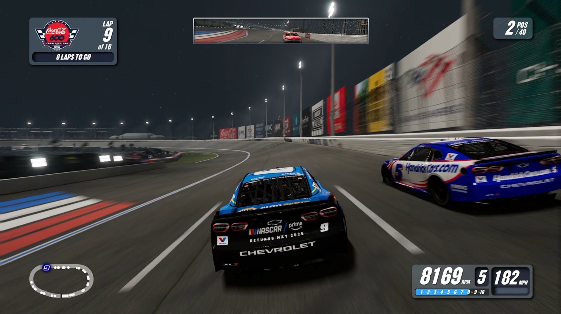 A screenshot from NASCAR 25 of the number 9 and number 5 cars racing at Charlotte Motor Speedway in the Coke 600.