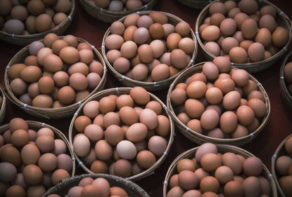 Baskets of brown eggs