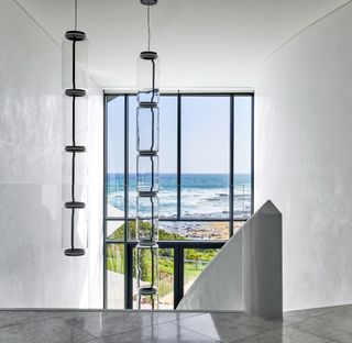 Staircase looking out at Horizon Flinders House by Mim Design