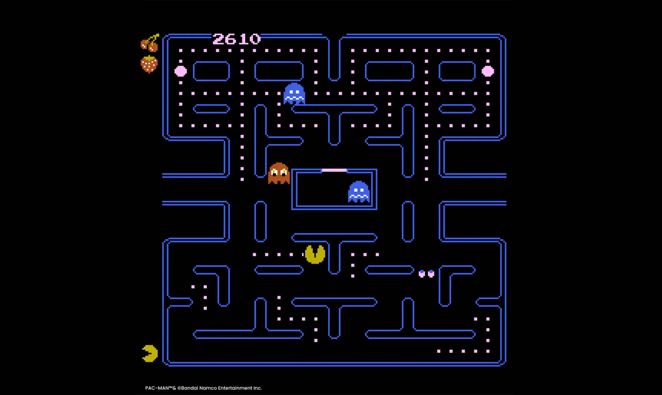 Pac-Man 7800 gameplay featuring blue maze with blue and orange ghosts.