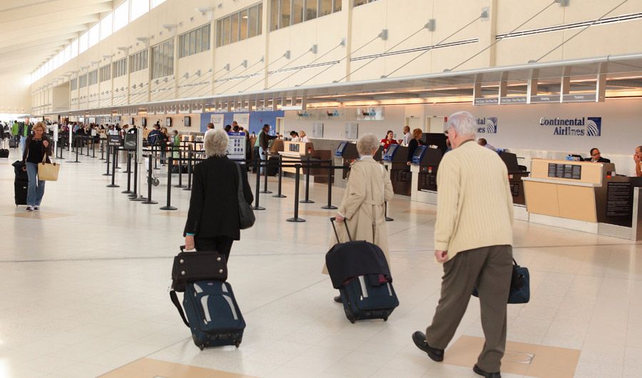 Pulling suitcases at airport