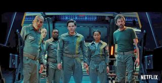 The Cloverfield Paradox the station's crew looks collectively into a hallway