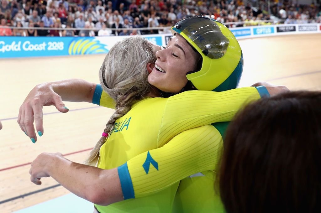 Kaarle McCulloch and Stephanie Morton celebrate their gold medal