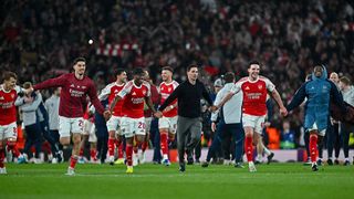 Arsenal players celebrate in a line after reaching the Champions League Final 2026