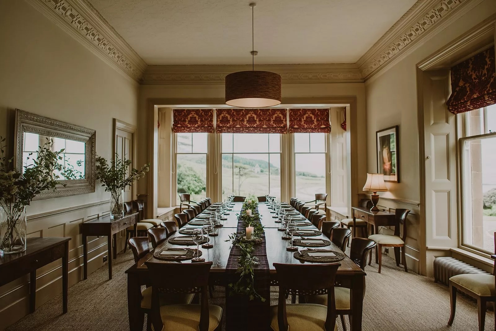 A view along the dining room at Ronachan, featuring a large dining table