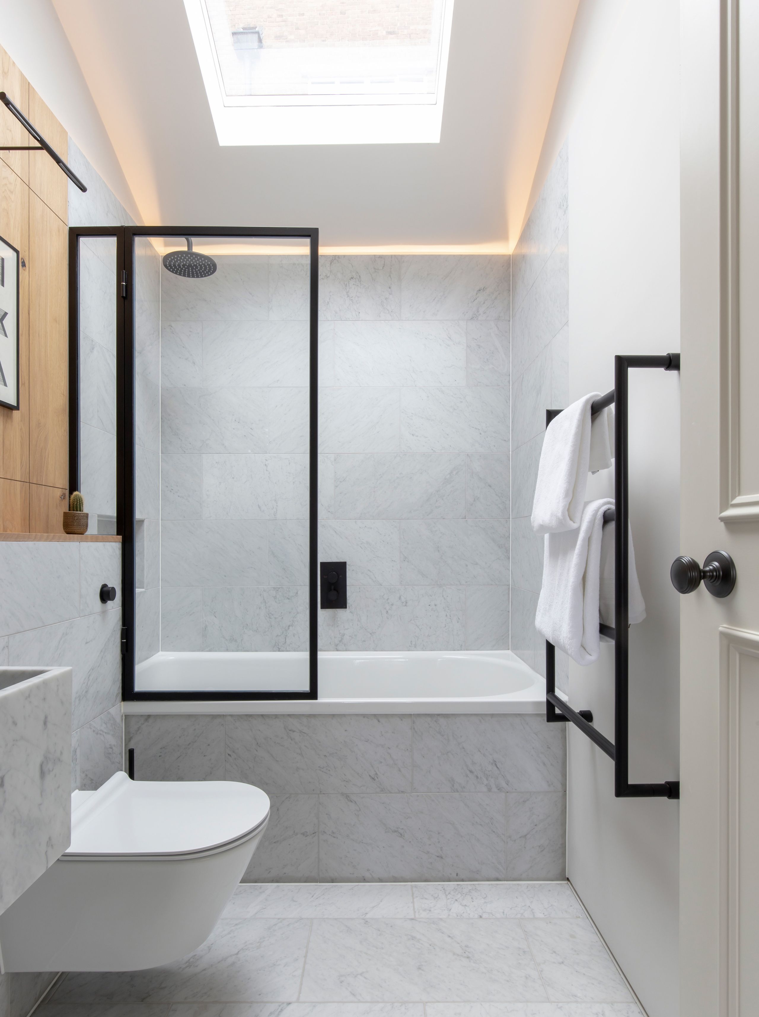White bathroom with black shower