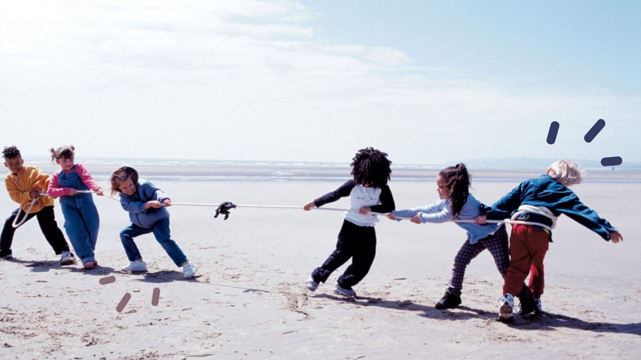 Image of children in tug of war to illustrate gender equality