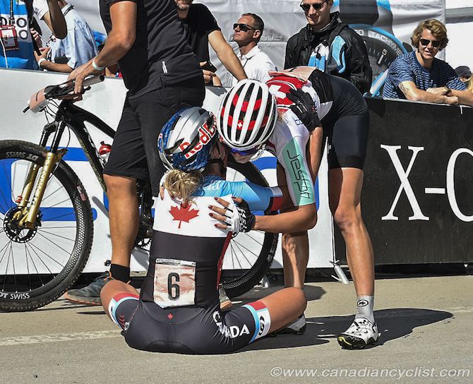 Jolanda Neff (Switzerland) gives Emily Batty (Canada) a hug