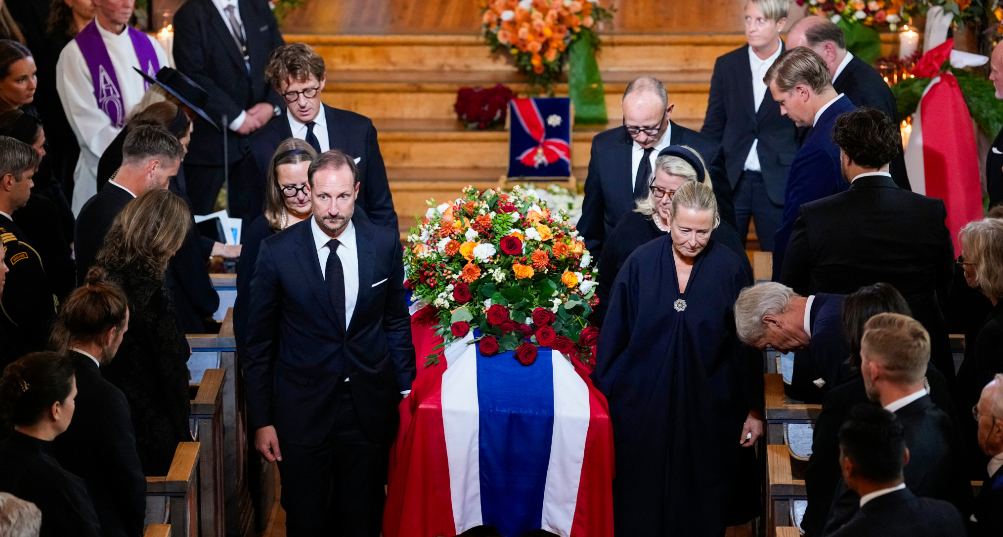 King Haakon and family carrying Princess Astrid's coffin at her funeral
