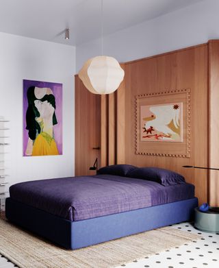 A bedroom with purple bedding and. a lavender artwork